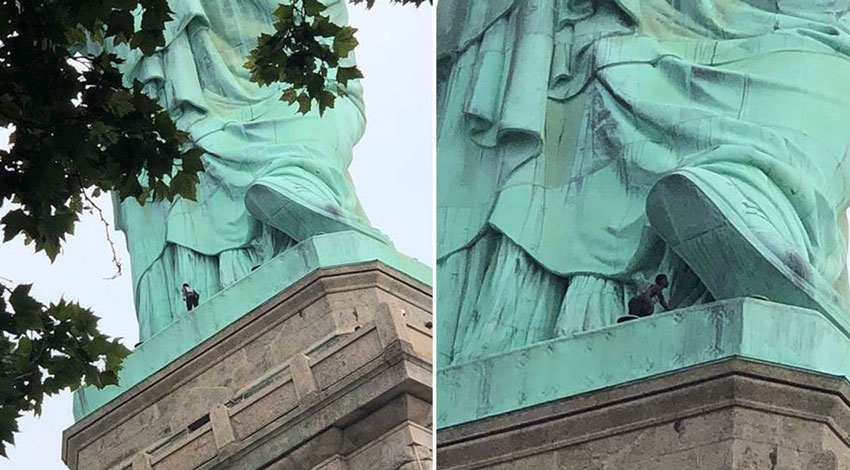 Активистка борьбы за права иммигрантов забралась на статую Свободы в Нью-Йорке