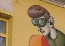 В Киеве стены домов разрисуют граффити 