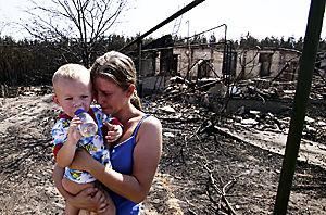 В охваченной лесными пожарами европейской части страны огонь уничтожил 2200 жилых домов, погибли 34 человека