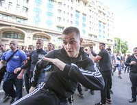 Стало известно имя молодчика, избившего журналистку на митинге в Киеве