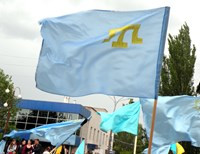 В Мелитополе прошел траурный митинг крымских татар (фото)