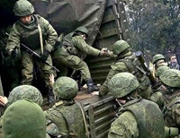 НАТО: значительная часть российских военных отведена из Украины