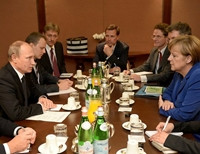 Путин все же смог встретиться с Меркель (фото)