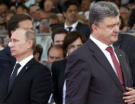 Путин позитивно оценил встречу с Порошенко в Милане 