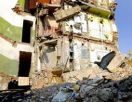 В Донецке террористы разрушают жилые дома и захватывают магазины