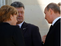 Меркель призвала Путина повлиять на боевиков для отвода тяжелой техники