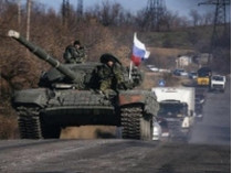 В Донецке боевики спрятали танки за спинами детей
