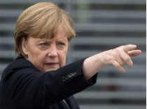 Меркель обвинила обе стороны конфликта на Донбассе в нарушении перемирия