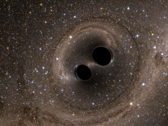 Сливающиеся черные дыры