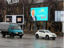 Агитационный плакат на одной из улиц Алма-Аты