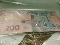 В Донецкой области на взятке «погорела» чиновница, вымогавшая деньги с переселенцев (фото)