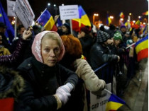 Участники демонстрации в Бухаресте