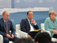Меркель и Олланд поговорили с Путиным по телефону о Донбассе
