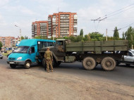 На Донетчине в результате столкновения военного «Урала» и маршрутки травмированы два человека (фото)