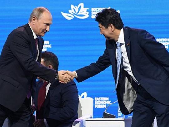 Синдзо Абэ и Владимир Путин