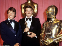 Джон Молло со статуэткой «Оскара»