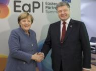 Порошенко и Меркель говорили в Брюсселе об украинских заложниках