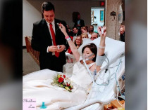 Невеста триумфально вскидывает руки, лежа на больничной кровати