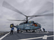 Опубликованы фото украинских вертолетов во время посадки на борт американского эсминца