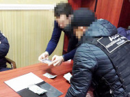 В Одессе задержан автовладелец, предлагавший полицейским 1 тысячу долларов взятки
