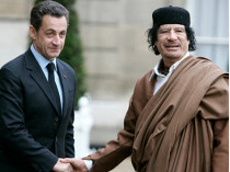 Николя Саркози и Муаммар Каддафи