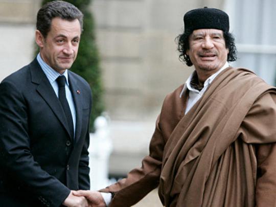Николя Саркози и Муаммар Каддафи