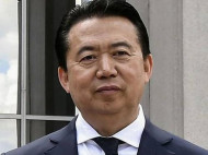 Задержанный в Китае глава Интерпола ушел в отставку (фото)