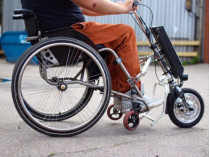 Лицо в инвалидной коляске