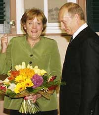 Канцлеру германии ангеле меркель и президенту россии владимиру путину в ресторане подавали ветчину и рислинг