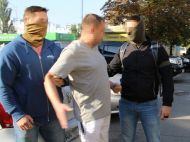 В Киеве разоблачили группу полицейских, которые следили за людьми за деньги (фото)