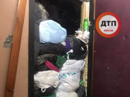 В Киеве спасатели с трудом отыскали труп пенсионерки в квартире, под потолок заваленной мусором (фото)