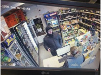 Кадр с видео ограбления магазина