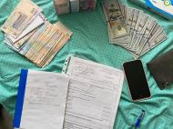 Вимагали 5 тисяч доларів за&nbsp;встановлення групи інвалідності: під Києвом медики нахабно оббирали ветеранів АТО
