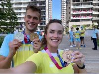 Михаил Романчук и Элина Свитолина с олимпийскими медалями
