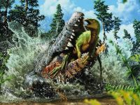 Крокодил їсть динозавра