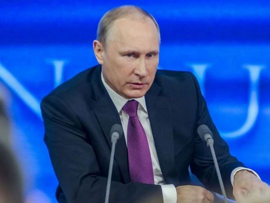 путін