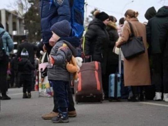 Біженці з України
