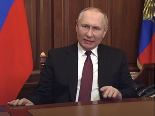 путін