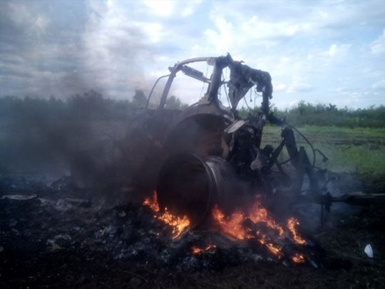 Под Харьковом российский снаряд попал в трактор в поле, тракторист погиб