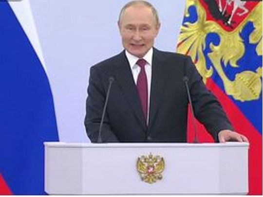 путін