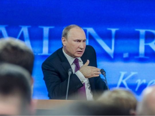 путін