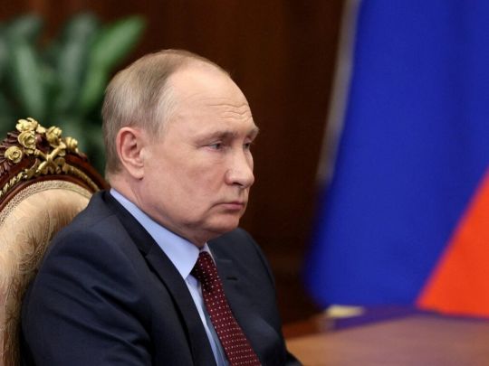 путін
