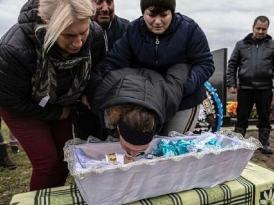 похорон убитого рашистами младенца