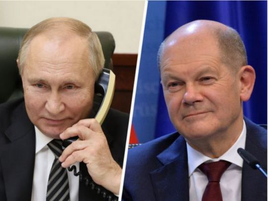 Путін та Шольц