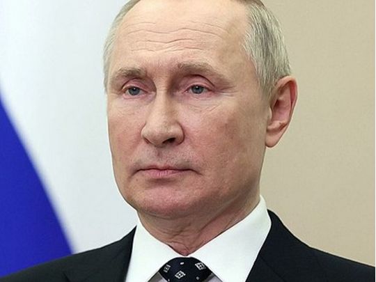 путін