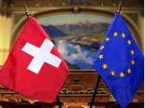 Прапори Швейцарії та ЄС