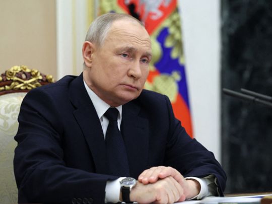 Путін