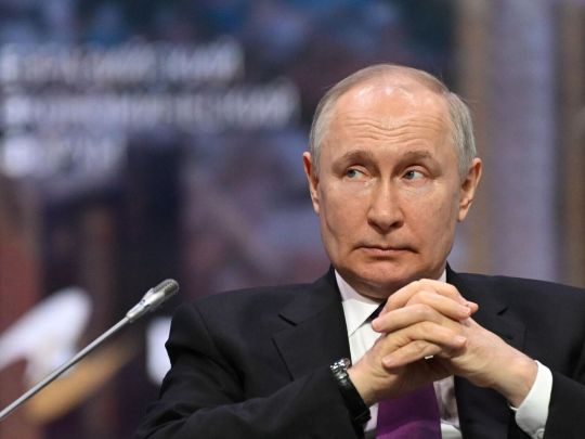 путін