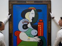 Картина Пабло Пикассо "Женщина с часами" 