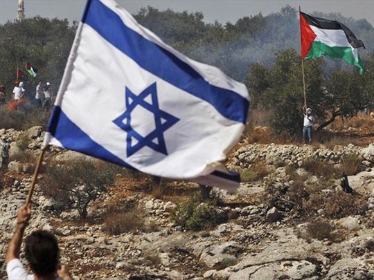 Прапори Ізраїлю та ХАМАС
